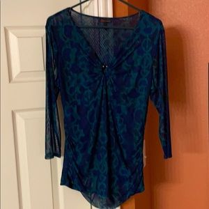 Poly/Spandex sheer ruched top. Like new.